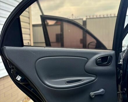 Черный Дэу Ланос, объемом двигателя 1.5 л и пробегом 162 тыс. км за 3100 $, фото 6 на Automoto.ua