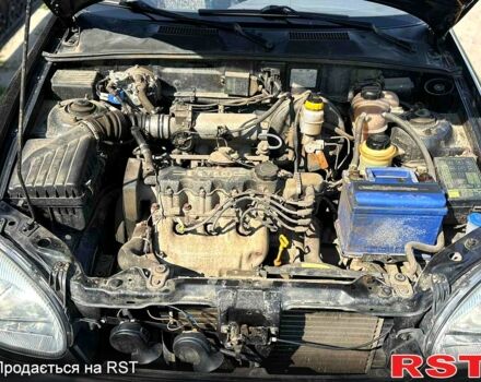 Черный Дэу Ланос, объемом двигателя 1.5 л и пробегом 162 тыс. км за 3100 $, фото 9 на Automoto.ua