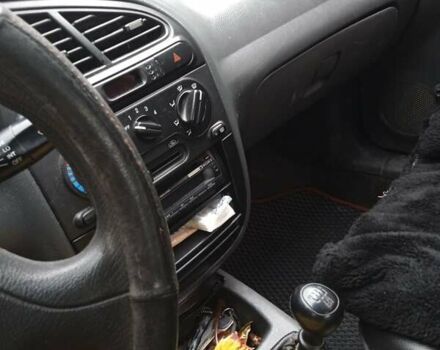 Черный Дэу Ланос, объемом двигателя 1.5 л и пробегом 197 тыс. км за 2500 $, фото 17 на Automoto.ua