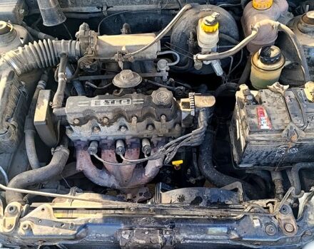 Деу Ланос 2009 у Жашкове на Automoto.ua Чорний Деу Ланос, об'ємом двигуна 1.5 л та пробігом 313 тис. км за 1650 $, фото 8 на Automoto.ua