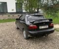 Черный Дэу Ланос, объемом двигателя 1.5 л и пробегом 144 тыс. км за 1500 $, фото 1 на Automoto.ua