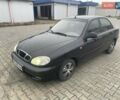 Черный Дэу Ланос, объемом двигателя 1.6 л и пробегом 170 тыс. км за 2400 $, фото 1 на Automoto.ua
