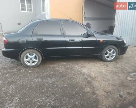 Черный Дэу Ланос, объемом двигателя 1.5 л и пробегом 76 тыс. км за 2300 $, фото 3 на Automoto.ua