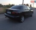 Черный Дэу Ланос, объемом двигателя 1.6 л и пробегом 275 тыс. км за 3350 $, фото 2 на Automoto.ua