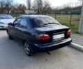 Черный Дэу Ланос, объемом двигателя 1.6 л и пробегом 326 тыс. км за 2700 $, фото 1 на Automoto.ua