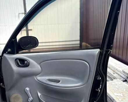 Черный Дэу Ланос, объемом двигателя 1.5 л и пробегом 162 тыс. км за 3100 $, фото 7 на Automoto.ua