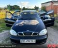 Черный Дэу Ланос, объемом двигателя 1.5 л и пробегом 162 тыс. км за 3100 $, фото 1 на Automoto.ua
