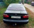 Черный Дэу Ланос, объемом двигателя 1.6 л и пробегом 200 тыс. км за 2500 $, фото 1 на Automoto.ua