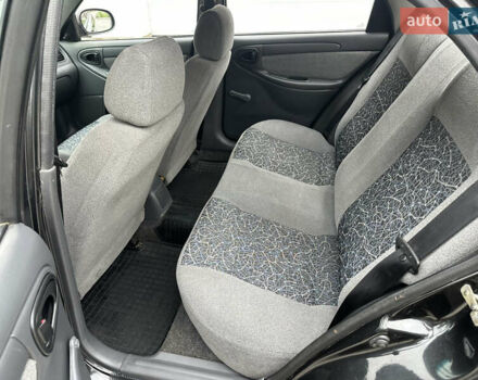 Черный Дэу Ланос, объемом двигателя 1.5 л и пробегом 158 тыс. км за 2850 $, фото 33 на Automoto.ua