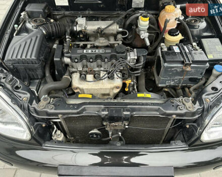 Черный Дэу Ланос, объемом двигателя 1.5 л и пробегом 158 тыс. км за 2850 $, фото 42 на Automoto.ua