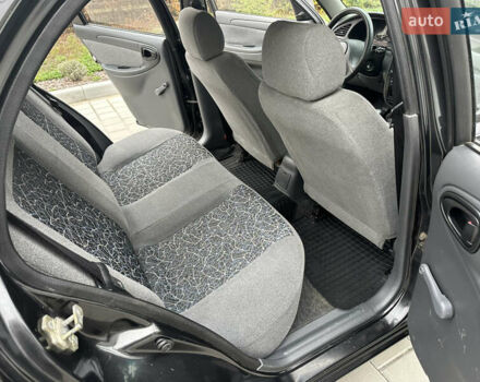 Черный Дэу Ланос, объемом двигателя 1.5 л и пробегом 158 тыс. км за 2850 $, фото 31 на Automoto.ua