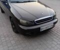 Черный Дэу Ланос, объемом двигателя 1.6 л и пробегом 222 тыс. км за 3100 $, фото 1 на Automoto.ua