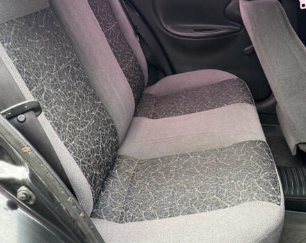 Черный Дэу Ланос, объемом двигателя 1.5 л и пробегом 270 тыс. км за 2550 $, фото 5 на Automoto.ua