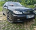 Черный Дэу Ланос, объемом двигателя 1.5 л и пробегом 210 тыс. км за 1843 $, фото 1 на Automoto.ua