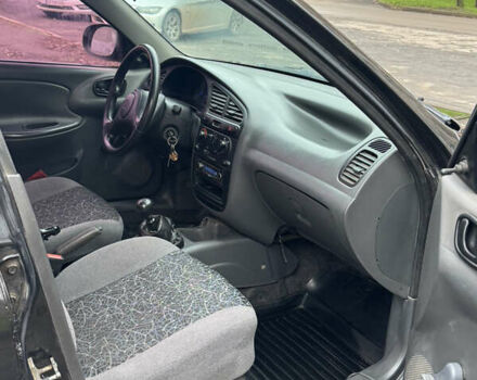 Черный Дэу Ланос, объемом двигателя 1.5 л и пробегом 270 тыс. км за 2550 $, фото 4 на Automoto.ua