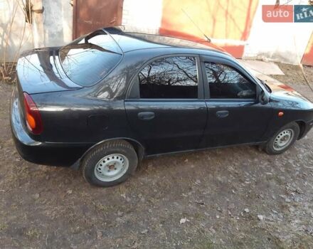 Черный Дэу Ланос, объемом двигателя 1.6 л и пробегом 160 тыс. км за 2900 $, фото 3 на Automoto.ua