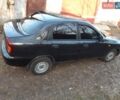 Черный Дэу Ланос, объемом двигателя 1.6 л и пробегом 160 тыс. км за 2900 $, фото 3 на Automoto.ua