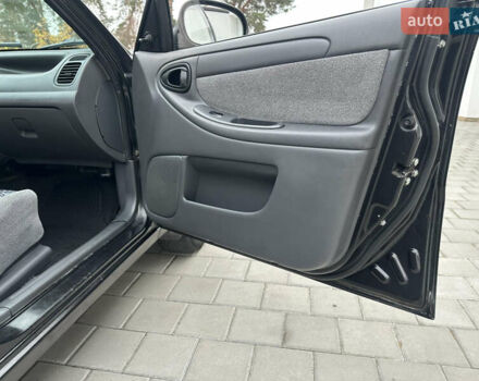 Черный Дэу Ланос, объемом двигателя 1.5 л и пробегом 158 тыс. км за 2850 $, фото 36 на Automoto.ua