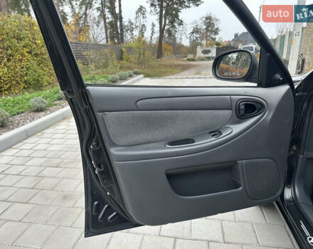 Черный Дэу Ланос, объемом двигателя 1.5 л и пробегом 158 тыс. км за 2850 $, фото 35 на Automoto.ua