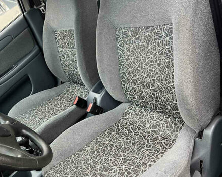 Черный Дэу Ланос, объемом двигателя 1.5 л и пробегом 158 тыс. км за 3100 $, фото 11 на Automoto.ua