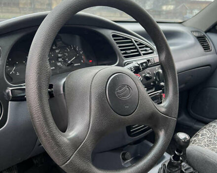 Черный Дэу Ланос, объемом двигателя 1.5 л и пробегом 158 тыс. км за 3100 $, фото 13 на Automoto.ua