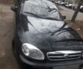 Черный Дэу Ланос, объемом двигателя 1.5 л и пробегом 98 тыс. км за 4200 $, фото 1 на Automoto.ua
