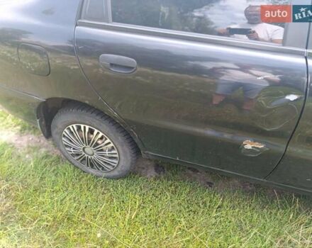Чорний Деу Ланос, об'ємом двигуна 1.5 л та пробігом 248 тис. км за 1850 $, фото 2 на Automoto.ua