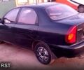 Черный Дэу Ланос, объемом двигателя 1.5 л и пробегом 164 тыс. км за 3500 $, фото 1 на Automoto.ua