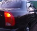 Черный Дэу Ланос, объемом двигателя 0 л и пробегом 240 тыс. км за 3000 $, фото 1 на Automoto.ua