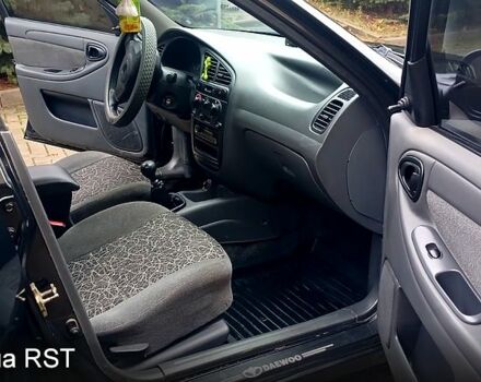 Черный Дэу Ланос, объемом двигателя 1.5 л и пробегом 170 тыс. км за 2500 $, фото 7 на Automoto.ua