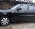 Чорний Деу Ланос, об'ємом двигуна 1.5 л та пробігом 21 тис. км за 4500 $, фото 1 на Automoto.ua