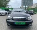 Черный Дэу Ланос, объемом двигателя 1.5 л и пробегом 105 тыс. км за 4200 $, фото 1 на Automoto.ua