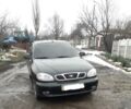 Черный Дэу Ланос, объемом двигателя 1.5 л и пробегом 200 тыс. км за 4500 $, фото 1 на Automoto.ua