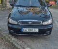 Черный Дэу Ланос, объемом двигателя 1.5 л и пробегом 165 тыс. км за 3700 $, фото 1 на Automoto.ua