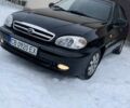 Черный Дэу Ланос, объемом двигателя 1.5 л и пробегом 202 тыс. км за 2950 $, фото 1 на Automoto.ua