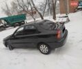 Черный Дэу Ланос, объемом двигателя 1.5 л и пробегом 202 тыс. км за 2999 $, фото 11 на Automoto.ua