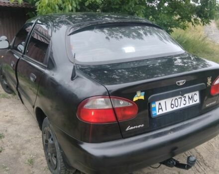 Чорний Деу Ланос, об'ємом двигуна 1 л та пробігом 2 тис. км за 2300 $, фото 22 на Automoto.ua