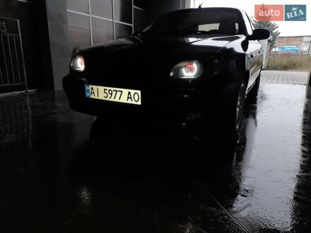 Чорний Деу Ланос, об'ємом двигуна 1.5 л та пробігом 208 тис. км за 3000 $, фото 1 на Automoto.ua