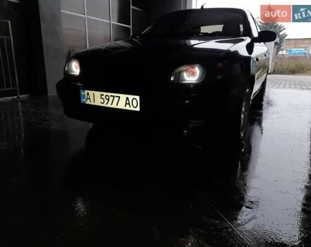 Черный Дэу Ланос, объемом двигателя 1.5 л и пробегом 208 тыс. км за 3000 $, фото 1 на Automoto.ua