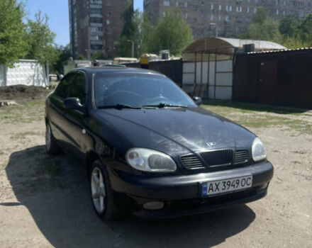 Черный Дэу Ланос, объемом двигателя 1.5 л и пробегом 123 тыс. км за 3300 $, фото 1 на Automoto.ua