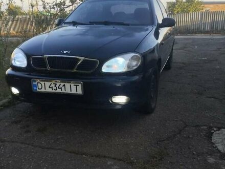 Черный Дэу Ланос, объемом двигателя 1.5 л и пробегом 162 тыс. км за 2000 $, фото 1 на Automoto.ua