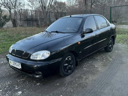 Черный Дэу Ланос, объемом двигателя 1.5 л и пробегом 270 тыс. км за 1900 $, фото 1 на Automoto.ua