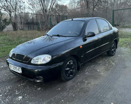 Черный Дэу Ланос, объемом двигателя 1.5 л и пробегом 270 тыс. км за 1900 $, фото 1 на Automoto.ua