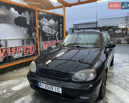 Черный Дэу Ланос, объемом двигателя 1.5 л и пробегом 145 тыс. км за 1799 $, фото 1 на Automoto.ua