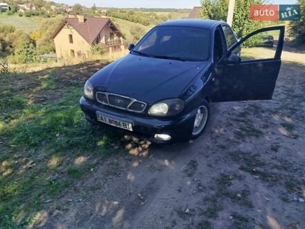 Чорний Деу Ланос, об'ємом двигуна 1.5 л та пробігом 360 тис. км за 1697 $, фото 1 на Automoto.ua
