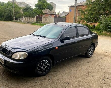 Чорний Деу Ланос, об'ємом двигуна 1.5 л та пробігом 300 тис. км за 2250 $, фото 1 на Automoto.ua