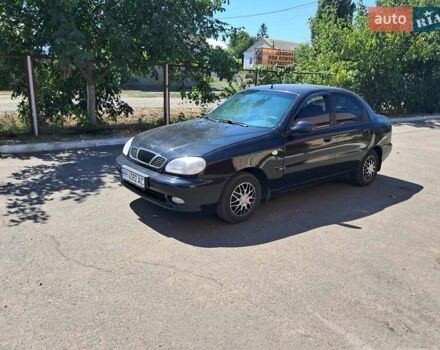 Черный Дэу Ланос, объемом двигателя 1.5 л и пробегом 400 тыс. км за 2400 $, фото 1 на Automoto.ua