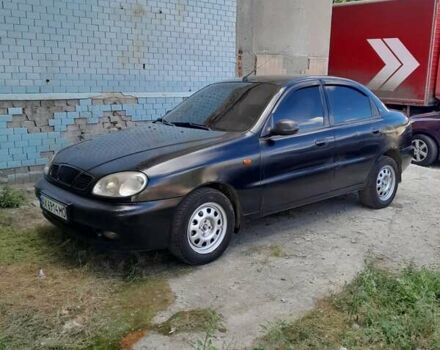 Чорний Деу Ланос, об'ємом двигуна 1.5 л та пробігом 371 тис. км за 2100 $, фото 1 на Automoto.ua