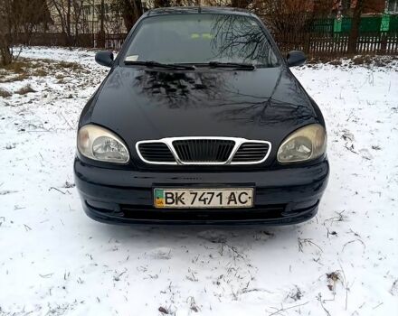 Чорний Деу Ланос, об'ємом двигуна 1.5 л та пробігом 100 тис. км за 1500 $, фото 1 на Automoto.ua