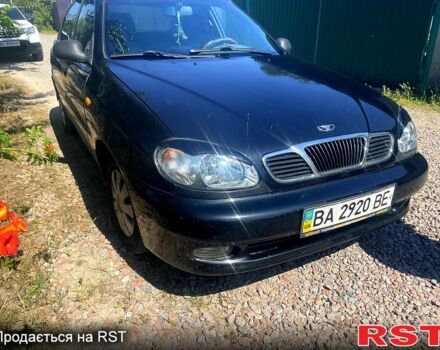 Черный Дэу Ланос, объемом двигателя 1.6 л и пробегом 200 тыс. км за 2000 $, фото 1 на Automoto.ua